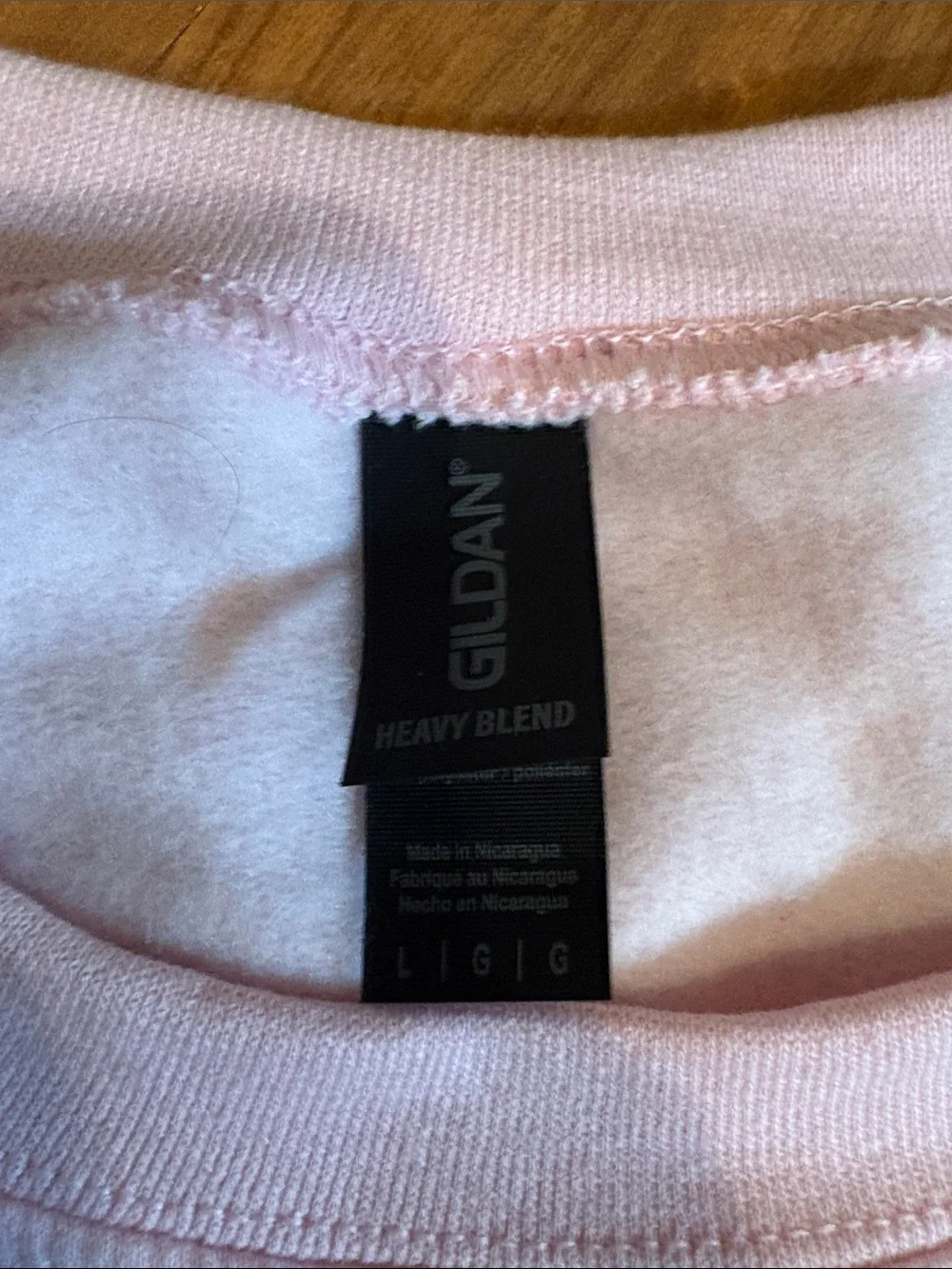 Pink Holiday Sminski Crewneck Sweatshirt with Green Character
